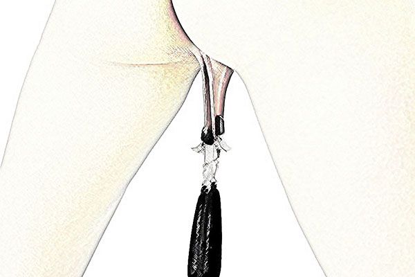 rear view of woman's genitals with weights hanging from her labia minora